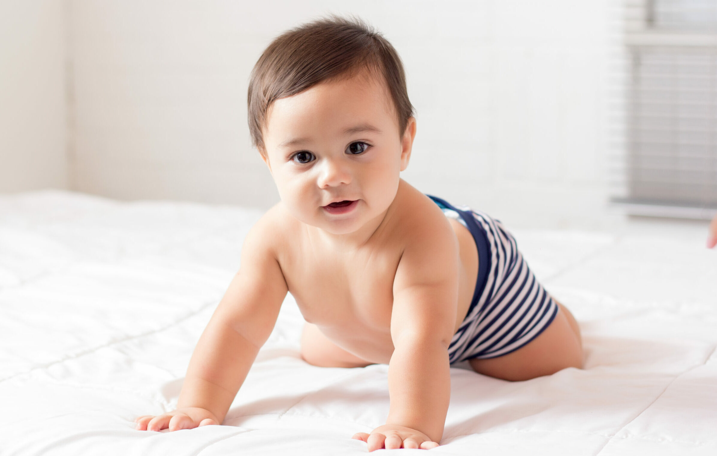 The stages of tummy time for babies